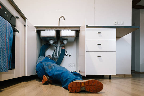 Professional Drain Cleaning technician working in Rockfall, CT